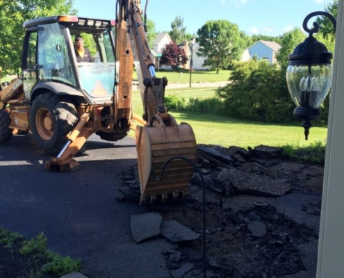 removing bad asphalt, concrete materials, driveway paving, recycled material